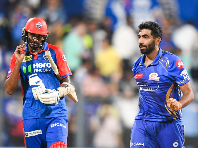 IPL 25: Santner, Bumrah, Surya star as MI storm into playoffs with a 59-run win over DC (Ld)