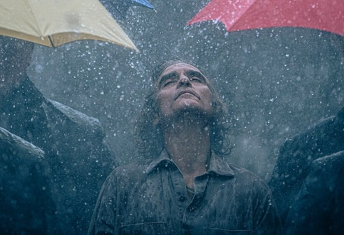 Joaquin Phoenix is dancing in the rain in new 'Joker 2' image