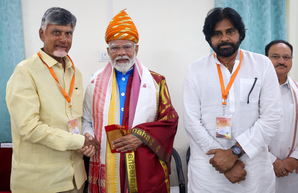 Prime Minister Narendra Modi being greeted by Telugu Desam Party Chief N Chandrababu Naidu and Jana Sena Party President Pawan Kalyan 