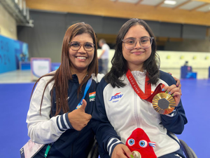 Coach Suma Shirur congratulates Avani Lekhara on winning gold in the Paralympic Games in Paris, France, on Friday. Photo credit: Suma Shirur