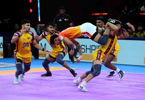 Pawan Sehrawat and Vijay Malik score Super 10s as Telugu Titans finish home leg with nail-biting win over Puneri Paltan in a Season 11 clash in the Pro Kabaddi League (PKL) at the GMCB Indoor Stadium at Gachibowli in Hyderabad on Saturday. Photo credit: PKL 