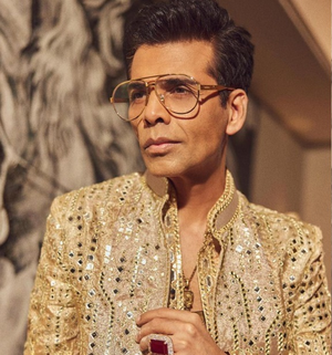 Karan Johar says 'learn how to be happy alone'