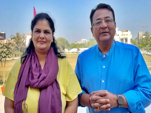 Cricket Australia's cultural ambassador, wife take dip at Sangam to celebrate 25th wedding anniversary