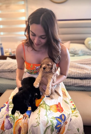Kiara Advani radiates happiness while playing with puppies during pregnancy