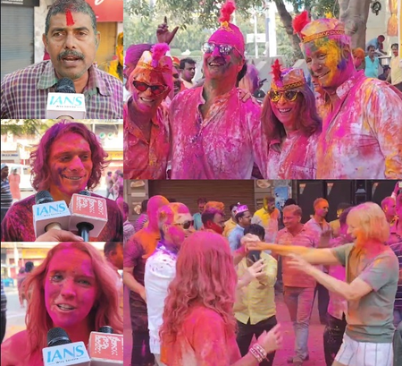 Foreign tourists join the Holi festivities in Varanasi