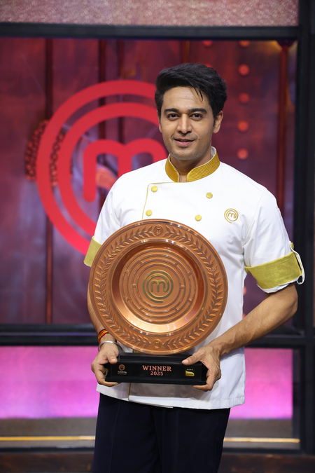 Actor turned culinary champion Gaurav Khanna lifts the Celebrity MasterChef trophy