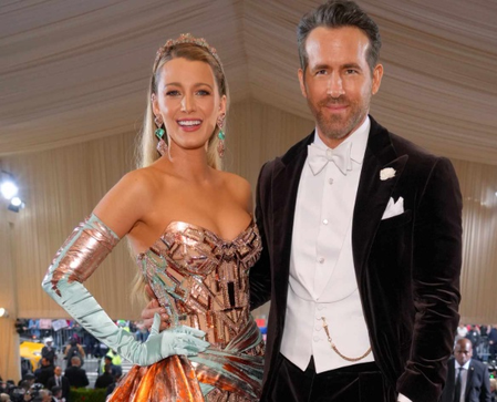 Blake Lively, Ryan Reynolds pack on PDA during ‘Deadpool’ star’s team’s game