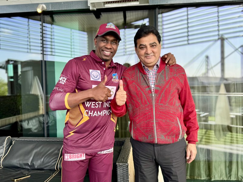 Dwayne Bravo With West Indies Champions owner Ajay Sethi. (Photo: WIC)