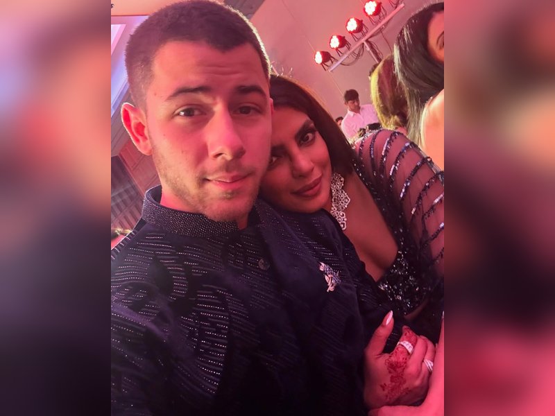Nick Jonas says he pulls up a chair when Priyanka watches TV in bed