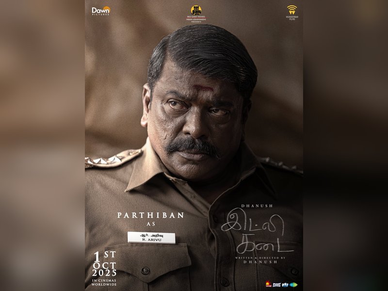 Parthiepan plays a cop called Arivu in Dhanush’s ‘Idly Kadai’ (Photo Credit: Dhanush/X)