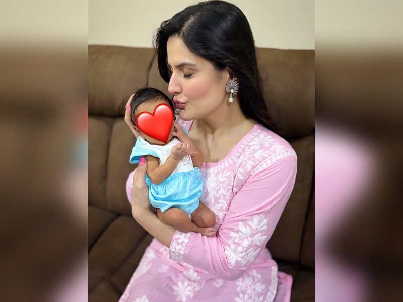 Zareen Khan pampers niece with a foot massage as she turns 4 months old