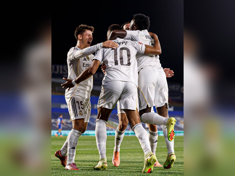 Real Madrid beat nine-man Getafe to top La Liga