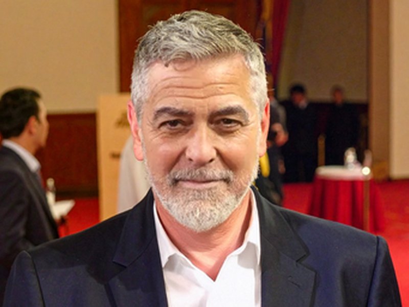 George Clooney says his daughter 'rolls her eyes' at him