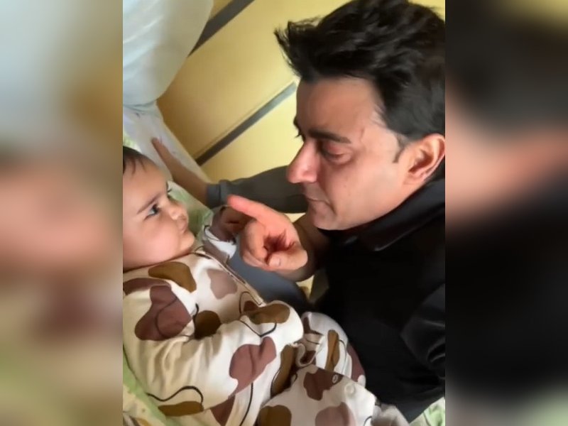 Gautam Rode enjoys a cute fight with his little bundle of joy