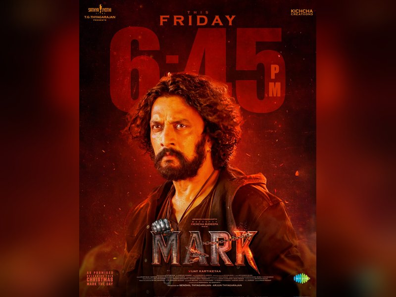 When Kichcha Sudeep interchanged seats with actress Roshini Prakash at the pre-release event of 'Mark'! (Photo Credit: Sathya Jyothi Films/X)