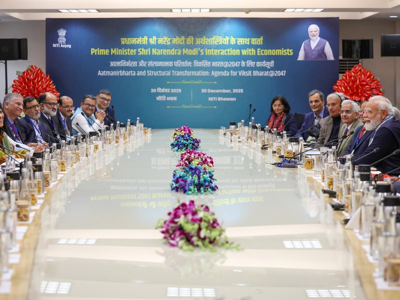 Prime Minister Narendra Modi chairs a pre-Budget meeting with leading economists, in New Delhi on Tuesday, December 30, 2025. Union Finance Minister Nirmala Sitharaman, NITI Aayog Vice Chairman Suman Bery and other eminent economists are present. (Photo: IANS/PMO)