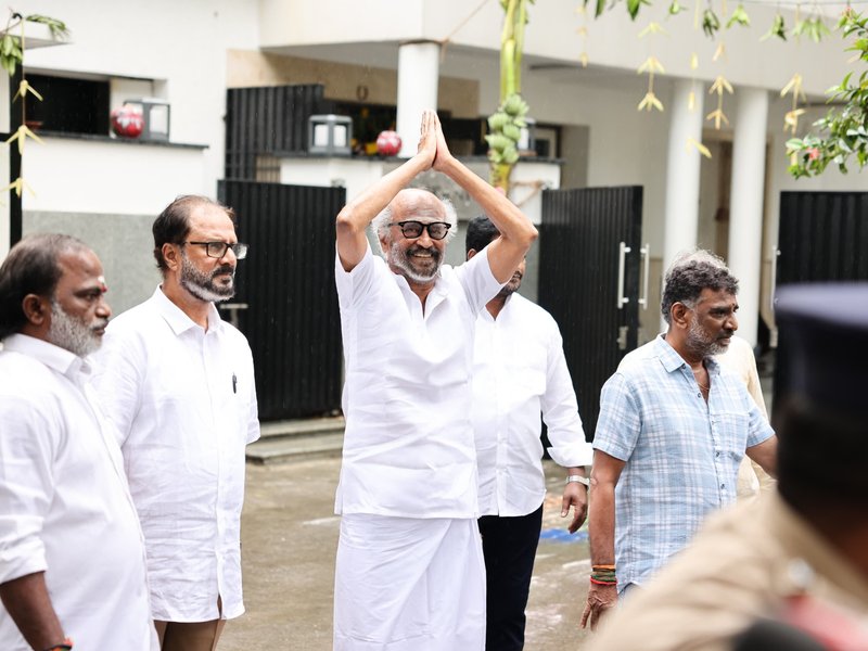 Rajinikanth greets fans outside residence (Photo Credit: IANS/PR)