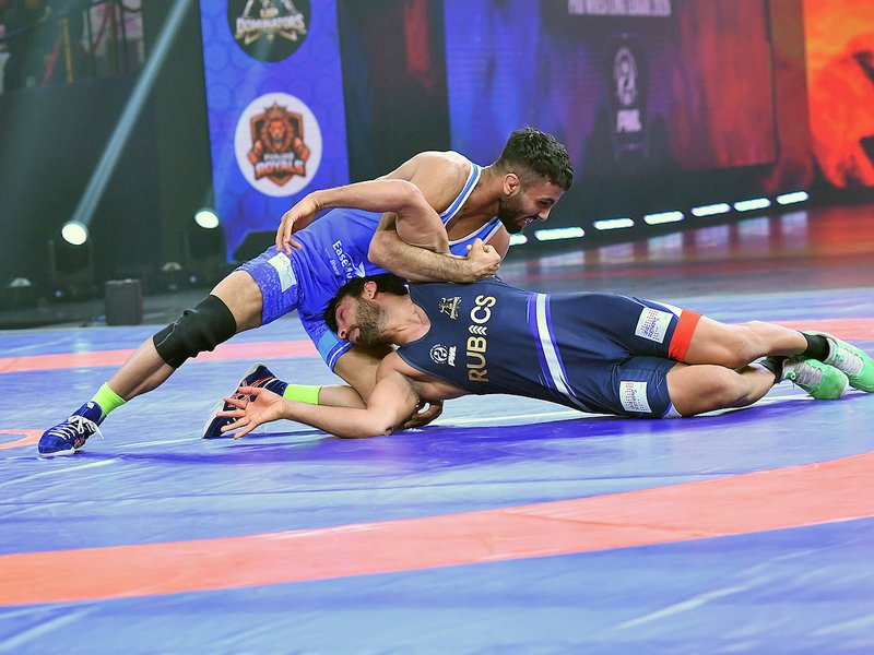 Sujeet Kalkal shines as Delhi Dangal Warriors take early control against UP Dominators in Match 7 of the Pro Wrestling League (PWL) 2026 at the Noida Indoor Stadium in Noida on Monday. Photo credit: PWL