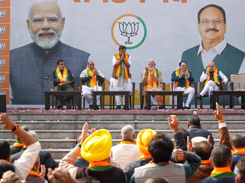 Nitin Nabin greets the supporters after taking oath as BJP National President as Prime Minister Narendra Modi, Union Minister JP Nadda, Defence Minister Rajnath Singh, Union Minister for Road Transport and Highways Nitin Gadkari, and Union Home Minister Amit Shah look on during the organisational event (Sangathan Parv) at the BJP headquarters in New Delhi, Tuesday, January 20, 2026. (Photo: IANS/Wasim Sarvar)