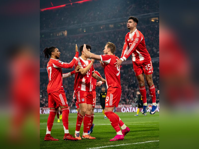 Kane's double sends Bayern through in Champions League