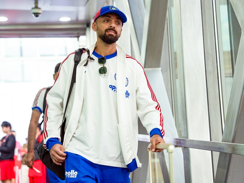  'He is only one game away from changing the tide,' says New Zealand captain Mitchell Santner on Varun Chakaravarthy's poor form ahead of the summit clash in the  ICC Men's T20 World Cup in Ahmedabad on Sunday. Photo credit: IANS 