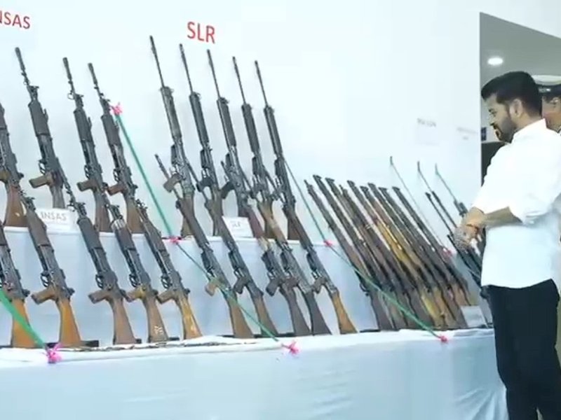 130 Maoists with 124 weapons surrender in Telangana (Photo: IANS)