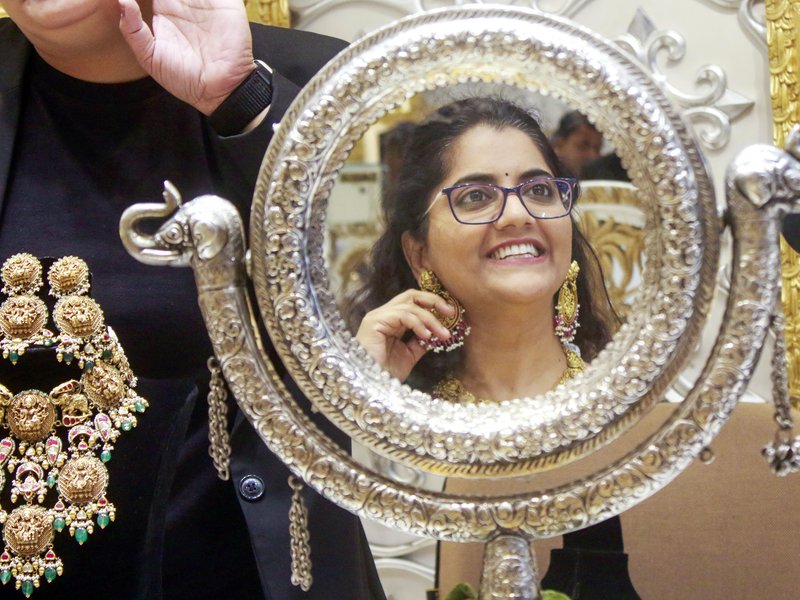 Gold, silver prices surge over decline in oil prices reducing inflation concern