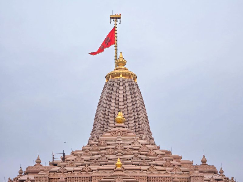 Ayodhya: A new flag is hoisted atop the spire of Shri Ram Janmabhoomi Temple after replacing the previous one on the auspicious occasion of the Hindu New Year in Ayodhya on Friday, March 20, 2026. (Photo: IANS/X/@ShriRamTeerth)