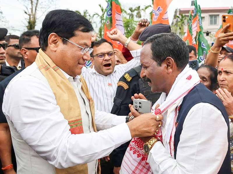 Dibrugarh: Union Minister Sarbananda Sonowal with BJP candidate from Makum constituency Sanjoy Kishan before the latter files his nomination for the Assam Assembly elections in Dibrugarh on Monday, March 23, 2026. (Photo: IANS/X/@sarbanandsonwal)