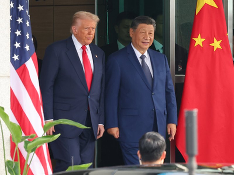 Ahead of China visit, Trump stresses ties and rivalry