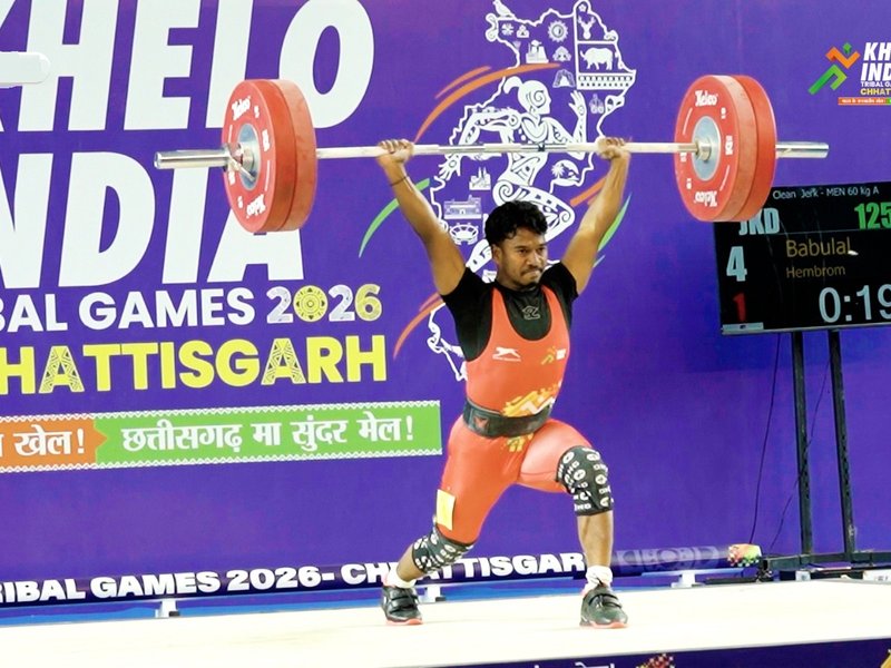 Forged in hardship, Jharkhand’s Babulal Hembrom lifts his way to glory in Khelo India Tribal Games in Raipur, Chhattisgarh. Photo credit: KITG 2026