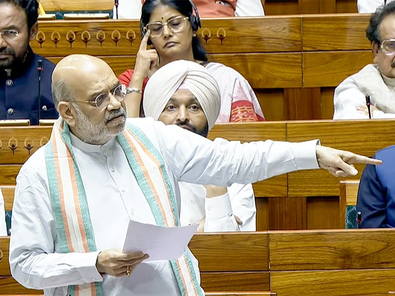 New Delhi: Union Home Minister Amit Shah speaks in the Lok Sabha during the second part of the Budget Session of Parliament in New Delhi on Monday, March 30, 2026. (Photo: IANS/Sansad TV)