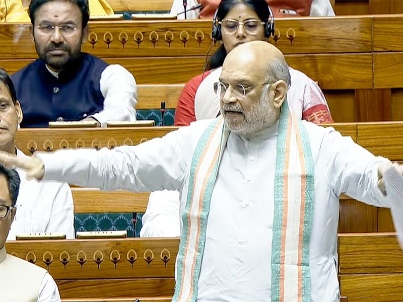 New Delhi: Union Home Minister Amit Shah speaks in the Lok Sabha during the second part of the Budget Session of Parliament in New Delhi on Monday, March 30, 2026. (Photo: IANS/Sansad TV)