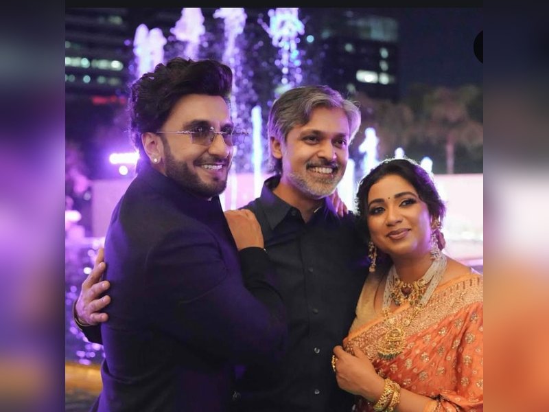 Shreya Ghoshal poses with Ranveer Singh, the latter hugs her husband
