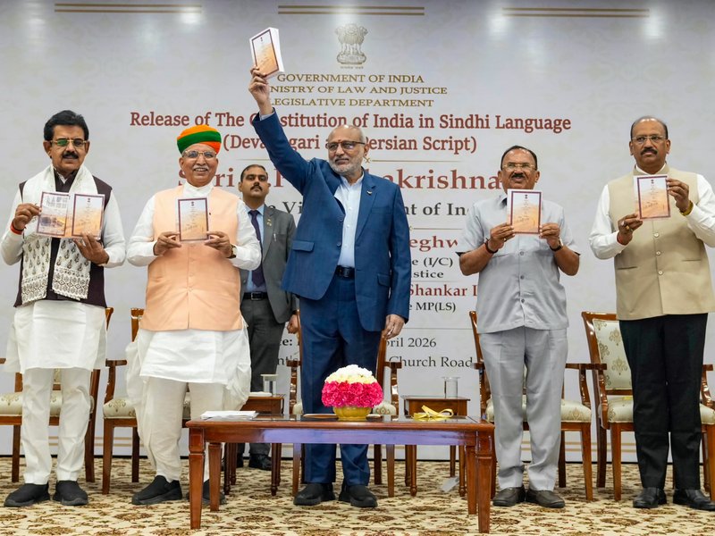 New Delhi: Vice-President C. P. Radhakrishnan releases the Constitution of India in the Sindhi language, in both Devanagari and Persian scripts, at Uprashtrapati Bhawan in New Delhi on Friday, April 10, 2026. Union Minister of State (I/C) for Law and Justice and Parliamentary Affairs Arjun Ram Meghwal, Rajasthan Legislative Assembly Speaker Vasudev Devnani, Lok Sabha MP Shankar Lalwani and other dignitaries were present. (Photo: IANS/X/@VPIndia)