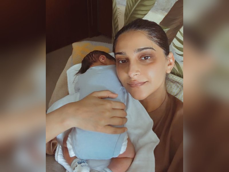 Sonam Kapoor flaunts her dark circles as she lovingly holds her newborn son