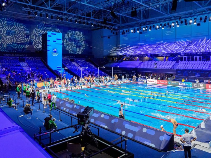 Russia, Belarus swimmers cleared to compete with flags, anthems as World Aquatics lifts ban   