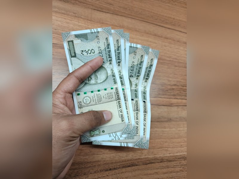 Rupee strengthens 25 paise as RBI curbs dollar demand from oil firms