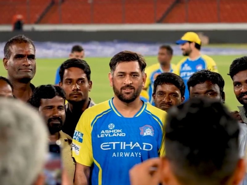 MS Dhoni clicks photos with groundmen ahead of Chennai Super Kings' clash with Sunrisers Hyderabad t the Rajiv Gandhi International Cricket Stadium in Hyderabad on Saturday. Photo credit: CSK/X
