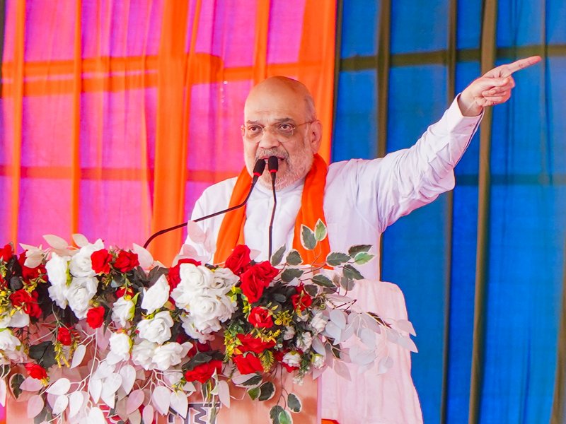 Paschim Bardhaman: Union Home Minister Amit Shah addresses a public meeting in support of BJP candidate from the Kulti Assembly constituency Dr. Ajay Poddar ahead of the West Bengal Assembly elections, in Paschim Bardhaman on Tuesday, April 21, 2026. (Photo: IANS)