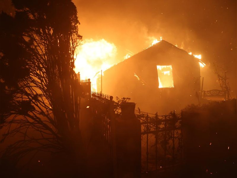 Wildfires ravage US, force mass evacuations