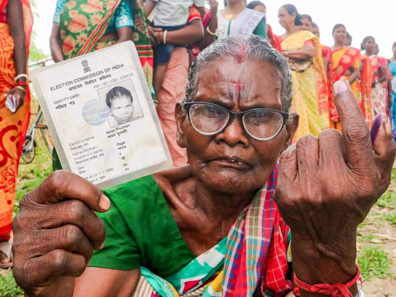 Coimbatore: Voters show their ID cards before casting their votes at polling stations during the Tamil Nadu Assembly elections 2026, in Coimbatore district of Tamil Nadu on Thursday, April 23, 2026. (IANS)