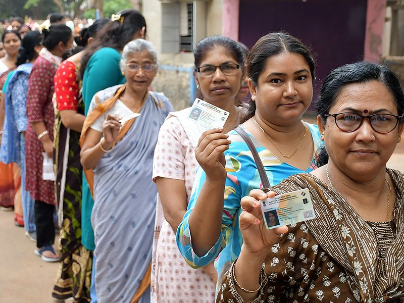Coimbatore: Voters show their ID cards before casting their votes at polling stations during the Tamil Nadu Assembly elections 2026, in Coimbatore district of Tamil Nadu on Thursday, April 23, 2026. (IANS)