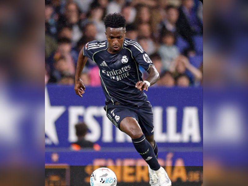 Vinicius' double keeps Madrid alive as Barca made to wait for La Liga title