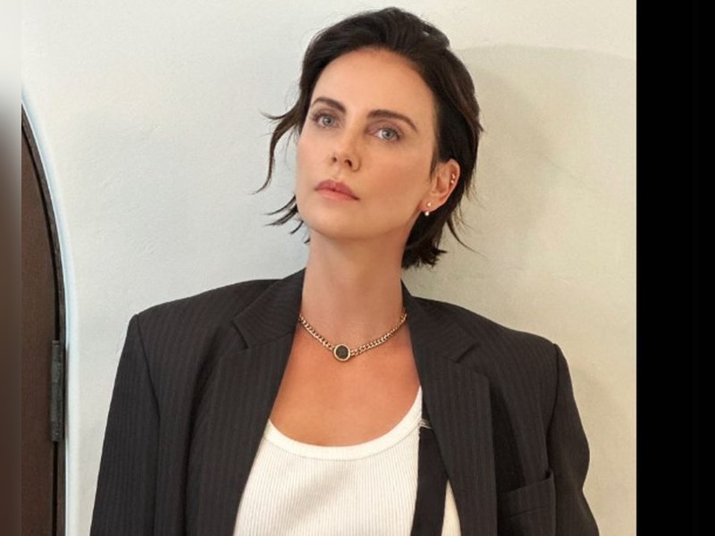Charlize Theron says her kids will have to work for a living