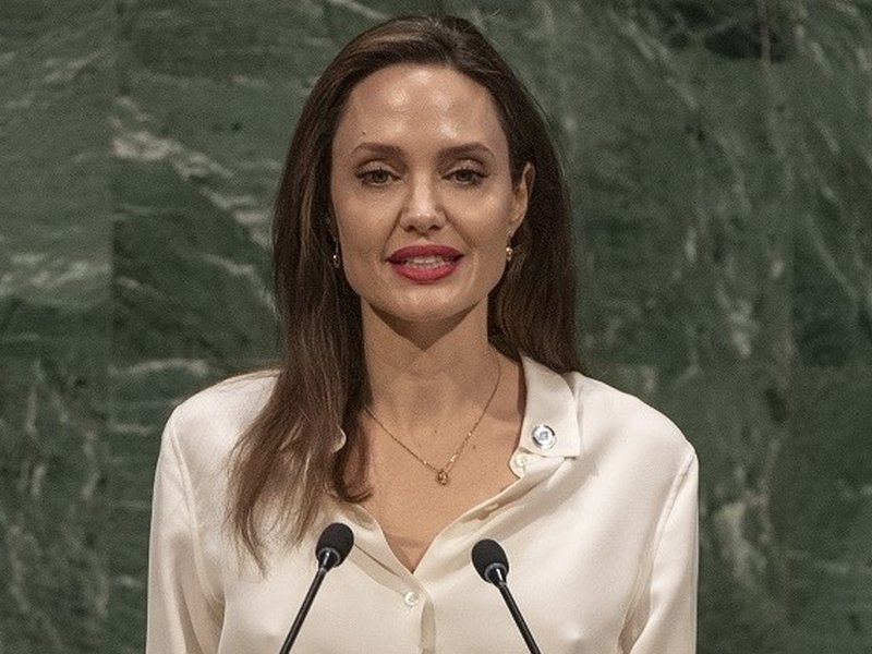 Angelina Jolie is selling her Los Angeles home for $30 million Title : Guterres pledges to make peacekeeping safer, appeals for help   Caption : Actress Angelina Jolie, who is the Special Envoy of the United Nations High Commissioner for Refugees, addresses the United Nations Peacekeeping Ministerial meeting on Friday, March 29, 2019. (Photo: UN/IANS)