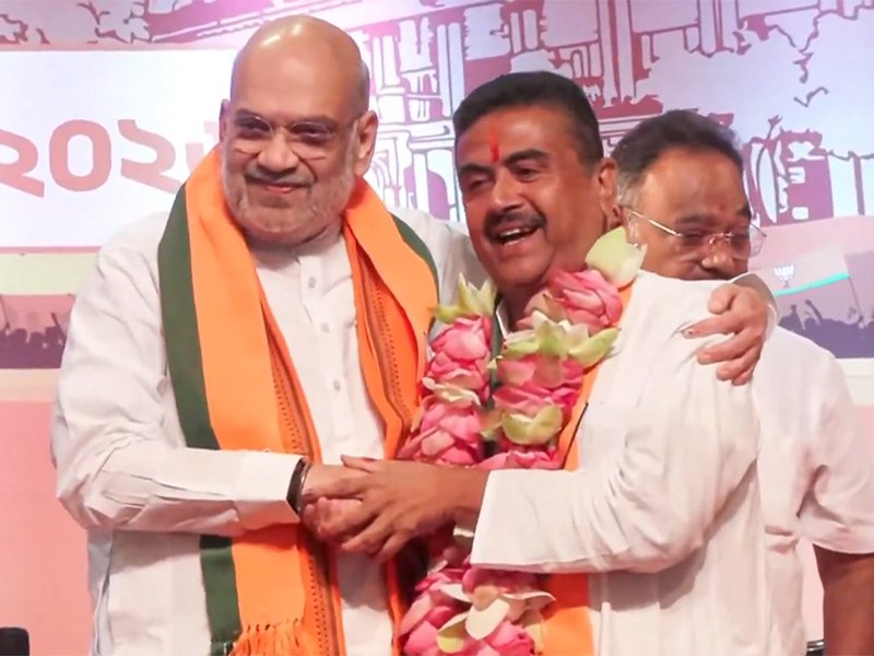 Kolkata: Union Home Minister Amit Shah, appointed as the Central Observer for the election of the legislative party leader in West Bengal, greets Suvendu Adhikari after he was elected Leader of the West Bengal BJP Legislative Party, in Kolkata district of West Bengal on Friday, May 8, 2026. (Photo: IANS/Video Grab)