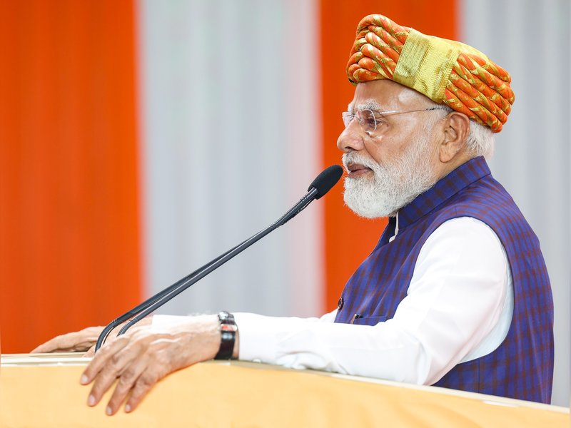 Jamnagar: Prime Minister Narendra Modi speaks during a public meeting in Jamnagar, Gujarat, on Sunday, May 10, 2026. (Photo: IANS/PMO)