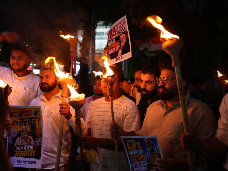 Haldwani: Youth Congress workers stage a torchlight protest march against the alleged NEET-UG 2026 paper leak issue from Budh Park to the SDM Court premises, in Haldwani district of Uttarakhand on Tuesday, May 12, 2026. (Photo: IANS)