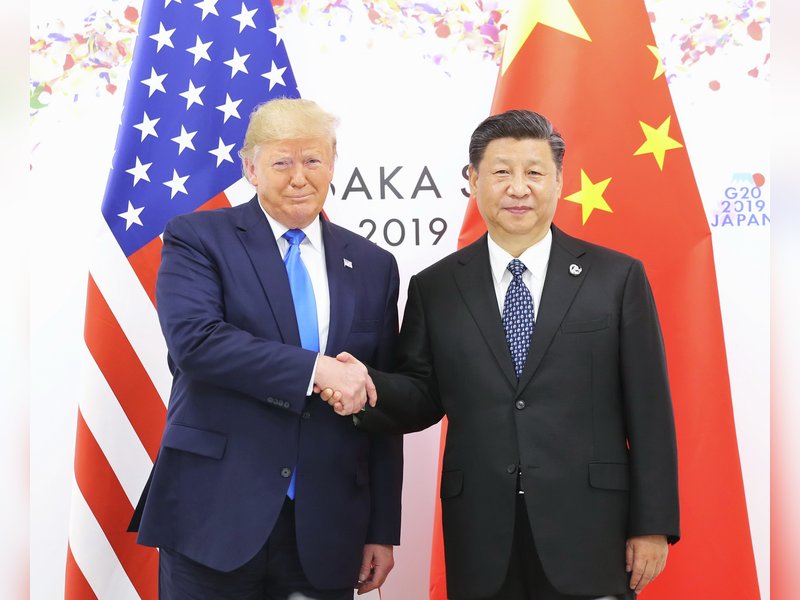 Trump faces pressure to confront China on rights, trade ahead of meeting with Xi